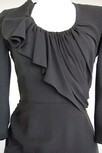 Lot 129 - A Lucien Lelong couture black crepe dinner...