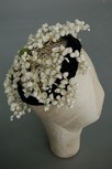 Lot 11 - A Christian Dior lily of the valley trimmed...