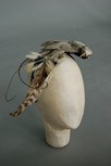 Lot 14 - Two headresses, 1990s, adorned with birds and...