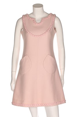 Lot 341 - An André Courrèges couture pink wool cocktail...