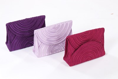 Lot 41 - Three Yves Saint Laurent clutch bags and a...
