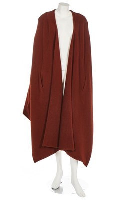 Lot 149 - A Sybilla pour Gibo brick-red wool cloak,...