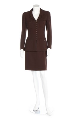 Lot 144 - A Chanel brown wool suit, Autumn-Winter 1996,...