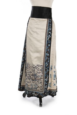 Lot 494 - An embroidered ivory satin skirt, Chinese,...