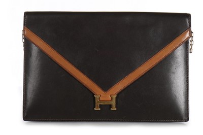 Lot 30 - An Hermès Lydie brown box leather clutch bag,...