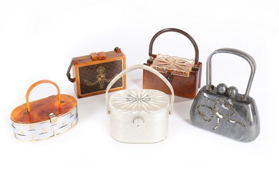 Lot 54 - Five Lucite handbags, late 1940s-50s,...