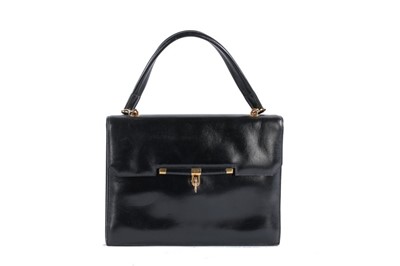 Lot 83 - An Hermès black box leather handbag, circa...
