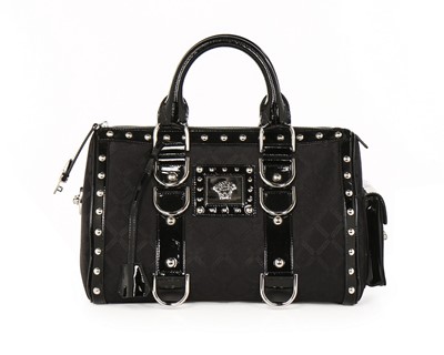 Lot 364 - A Versace 'Snap Out Of It' black patent...