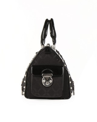 Lot 12 - A Versace 'Snap Out Of It' black patent...