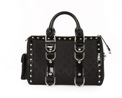Lot 12 - A Versace 'Snap Out Of It' black patent...