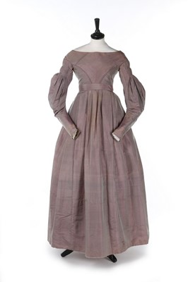 Lot 406 - A lilac-grey changeante silk dress, late 1830s,...