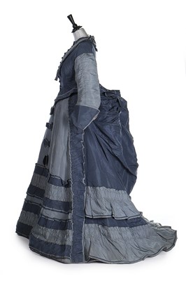 Lot 404 - A two-tone blue taffeta walking gown, circa...