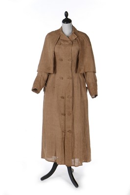Lot 392 - Two linen motoring coats, one with attached...