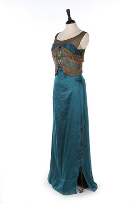 Lot 394 - A satin 'peacock' dress, circa 1912 but...
