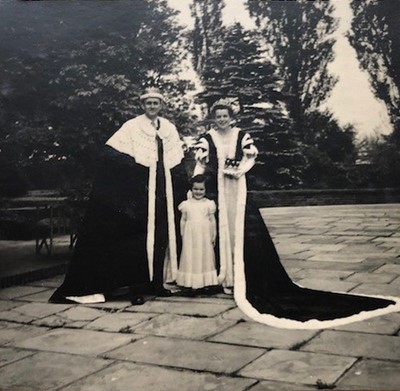 Lot 384 - An ivory satin court dress, worn by Lady...