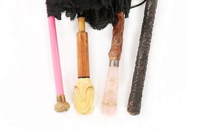 Lot 186 - A large group of mainly Edwardian parasols and...