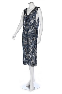 Lot 190 - A blue sequinned and black beaded tulle tunic,...