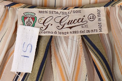 Lot 160 - Jackie Onassis' Gucci striped silk ensemble,...