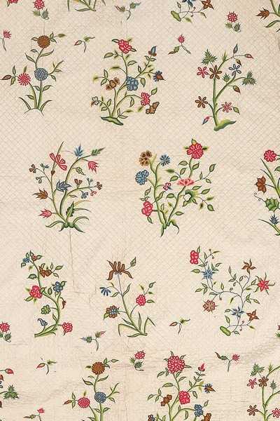 Lot 73 - The remains of a false-quilted and embroidered...