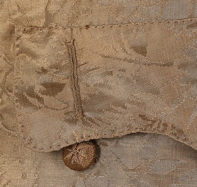 Lot 77 - A brown damask satin sleeved waistcoat, circa...