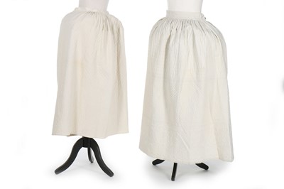 Lot 412 - Four quilted petticoats, late 18th and early...