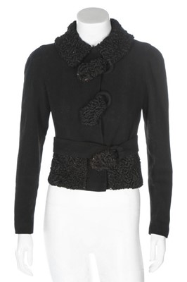 Lot 81 - A black wool and astrakhan jacket, probably...