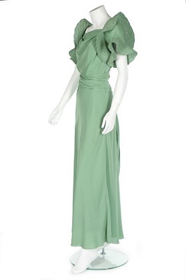 Lot 69 - A Jeanne Lanvin couture pale green silk crêpe...