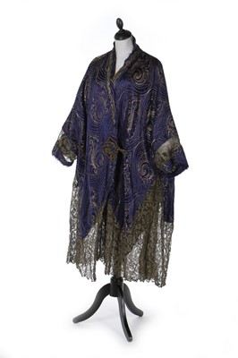 Lot 396 - A good ink-blue silk lamé opera coat,...