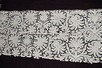 Lot 8 - Four panels of tapelace with needlepoint...