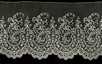 Lot 45 - A flounce of Brussels needlepoint application,...