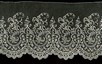 Lot 45 - A flounce of Brussels needlepoint application,...