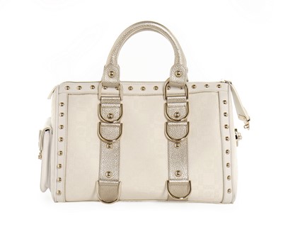 Lot 11 - A Versace 'Snap Out Of It' white and metallic...