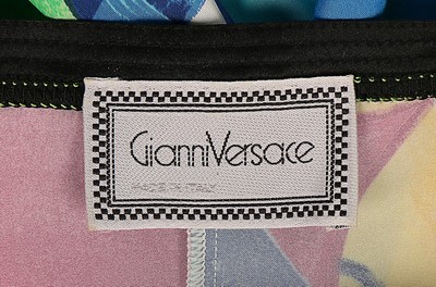 Lot 30 - Three colourful Versace ensembles, 1990s,...