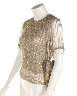 Lot 34 - A Loris Azzaro gold crochet and chain fringed...