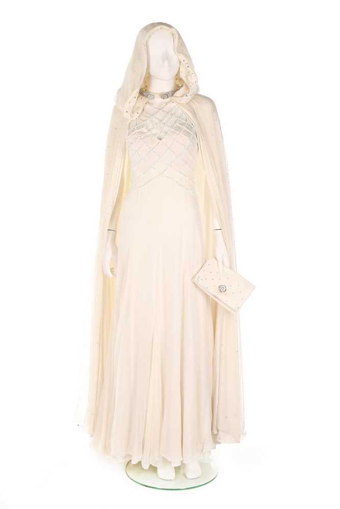 Lot 36 - A Loris Azzaro white jersey and silk-chiffon...