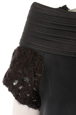 Lot 37 - A Versace black silk cocktail dress, late...