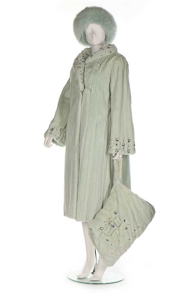 Lot 54 - A mint-green rabbit fur coat, 1990s,...