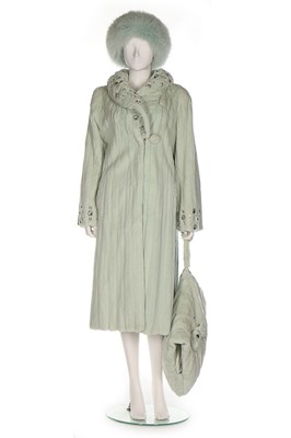 Lot 54 - A mint-green rabbit fur coat, 1990s,...