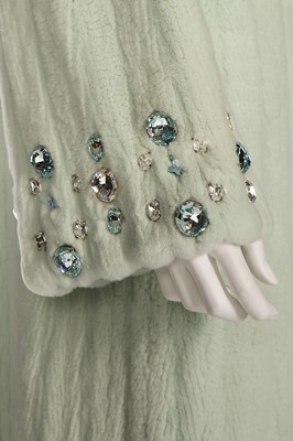 Lot 54 - A mint-green rabbit fur coat, 1990s,...