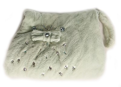 Lot 54 - A mint-green rabbit fur coat, 1990s,...