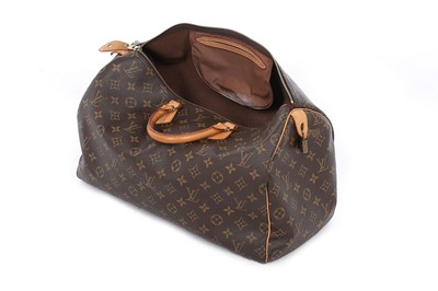 Lot 16 - A Louis Vuitton monogrammed leather speedy,...