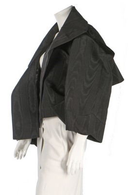 Lot 277 - A John Galliano over-sized black moiré jacket,...