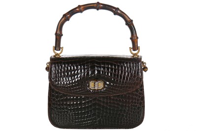 Lot 7 - A fine and rare Gucci brown crocodile handbag with bamboo handle, 1960s