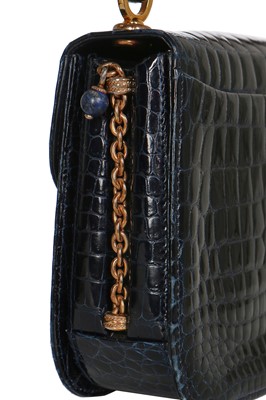 Lot 8 - A fine and rare Gucci ink-blue crocodile handbag with bamboo handle, 1960s
