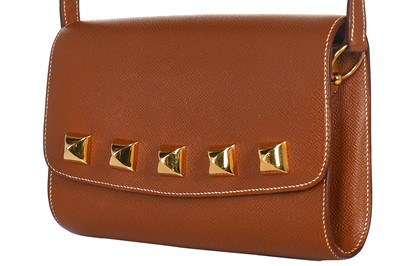 Lot 1 - An Hermès Ardennes leather Sac Doggy Medor cross-body bag, 1990s