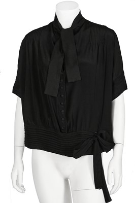 Lot 76 - A Gabrielle Chanel couture black silk crêpe blouse, probably circa 1924