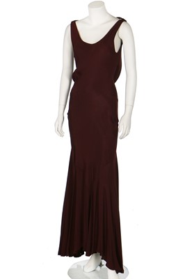 Lot 198 - A John Galliano burgundy crêpe bias-cut dress, 'Hairclips' collection, Autumn-Winter 1988-89