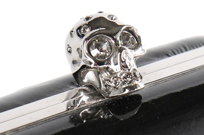Lot 107 - Alexander McQueen by Sarah Burton: three assorted clutch bags with skull clasps, circa 2011