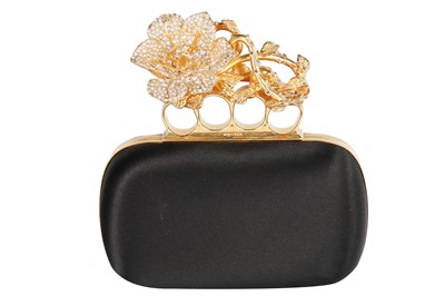 Lot 120 - Alexander McQueen by Sarah Burton black satin knuckle-duster clutch, circa 2015