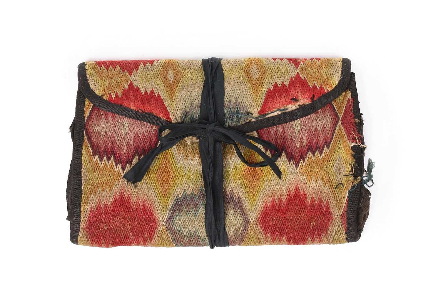 Lot 64 - A flame-stitched pocket book, worked by...